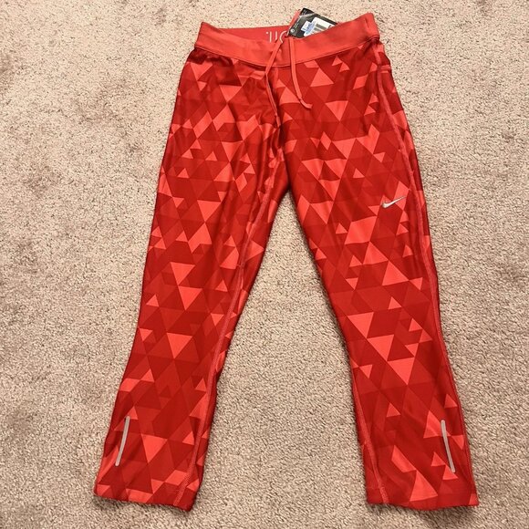 Nike. Size XS. Pink Red Dri-Fit. NWT. $55. Stretch. Zip Pocket. B53 - Picture 1 of 6